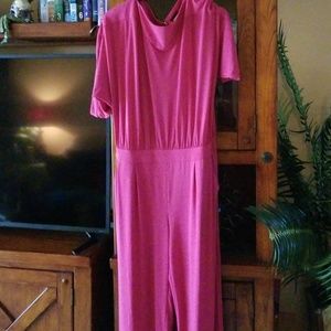 Corally colored jumpsuit by Iman